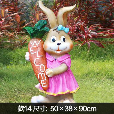 商店門(mén)口擺放一只歡迎光臨兔子雕塑