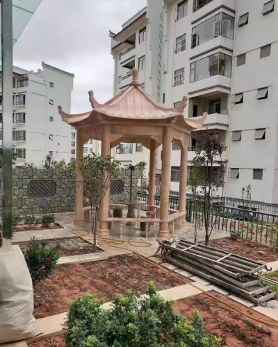 小區(qū)園林石涼亭，晚霞紅大理石石雕亭子